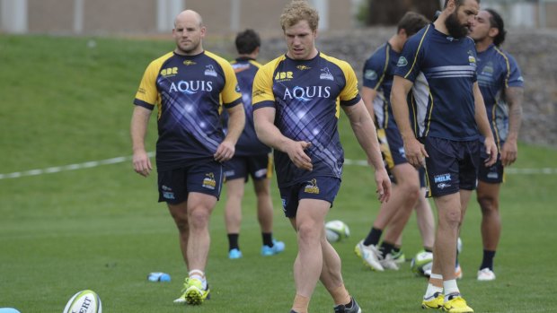 Big decision: Brumbies captain Stephen Moore, left, says David Pocock, centre, needs space and time to make a decision on his future.