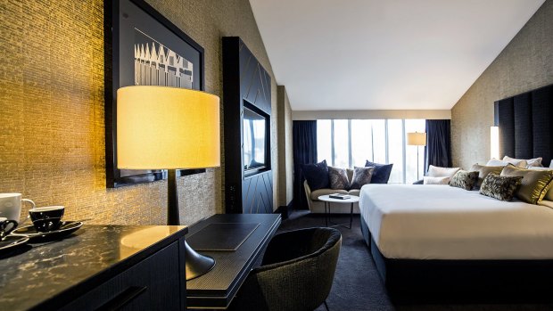 The black and gold colour scheme of the exterior extends to the reviewer's comfortable and commodious room.