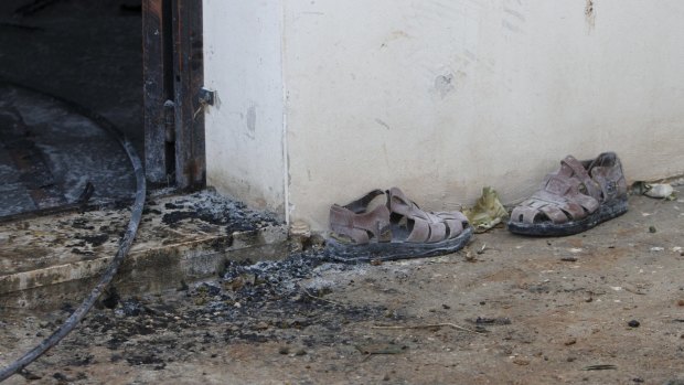 A pair of sandals outside the Dawabshe family home in the Israeli-occupied West Bank.