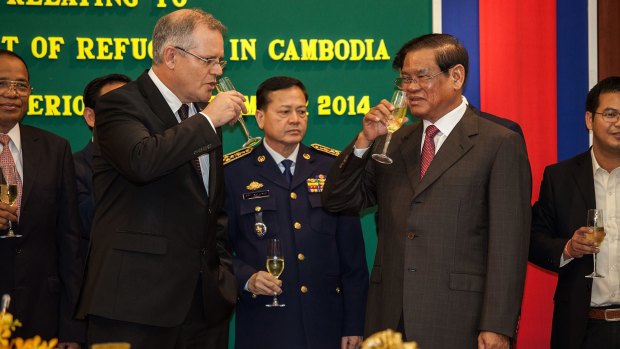 Immigration Minister Scott Morrison and Cambodian Interior Minister Sar Kheng in September.