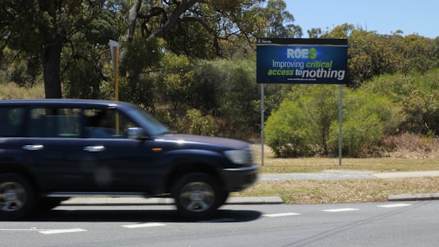 Protesters have altered Melville council's signage intended to support the project.  