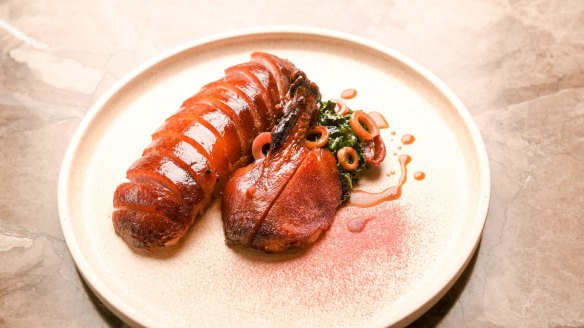 Dry-aged roast duck with quandong, black cabbage and bamboo.