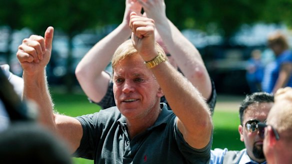 Former Louisiana state representative David Duke arrives to give remarks after a white nationalist protest was declared an unlawful assembly.