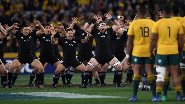 The All Black perform the famous haka before the game.