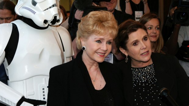 Carrie Fisher (left) and her mother Debbie Reynolds will be buried together at Forest Lawn cemetery in Hollywood Hills. 
