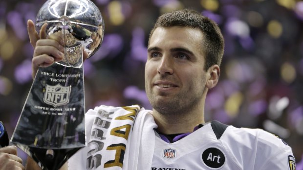 Big deal: Joe Flacco celebrates with the Lombardi Trophy after winning the Super Bowl in 2013. 