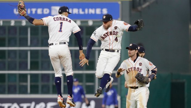 Houston Astros' Carlos Correa and George Springer celebrate.