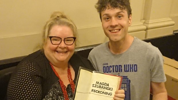 Kenny Pittock with Magda Szubanski and his ceramic Magda book, 2018.