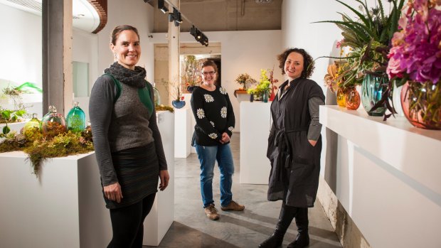 Glass artist Harriet Schwarzrock with florists Pauline Moule, of Bloomin' Mad Flowers, and Narelle Phillips.
