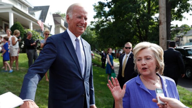 Biden on the presidential election campaign trail with Hillary Clinton in August.