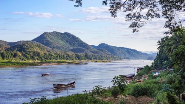 Mekong River and mountains view in Luang Prabang, Laos.