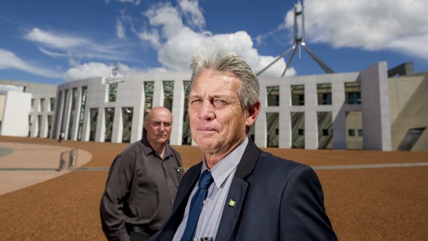 The island's Tourism Minister, Timothy Sheridan, and Chief Minister, Lisle Snell, in Canberra last year to try to dissuade federal parliamentarians from abolishing their Assembly.