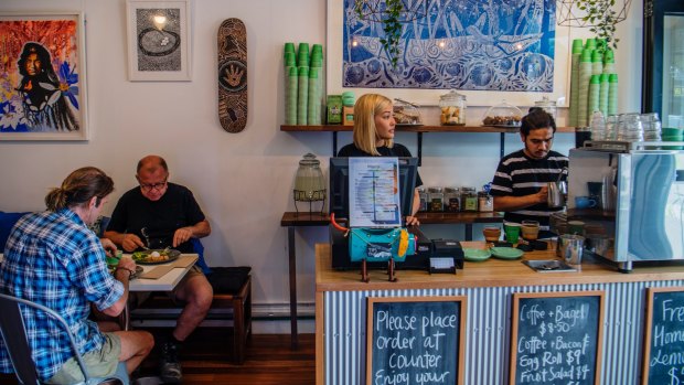 The Tin Humpy Cafe in Redfern is decorated with the work of local artists.