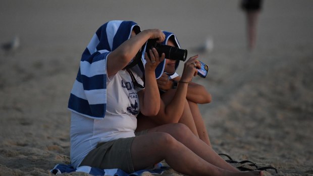 After a hot night, many Sydneysiders hit the beach early on Wednesday. 