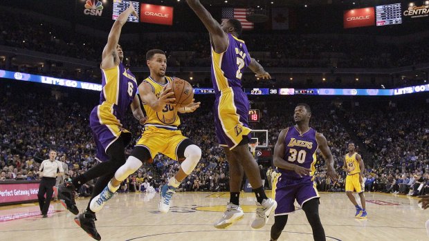 Air time: Steph Curry in action against the Los Angeles Lakers late last year.