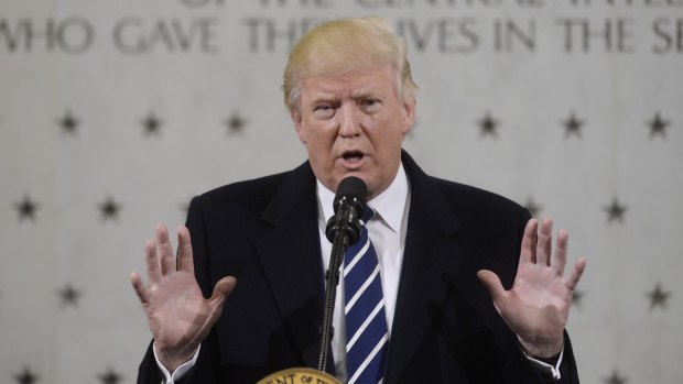 'I love you, I respect you, and you will be leading the charge.' Trump addresses the CIA last month.