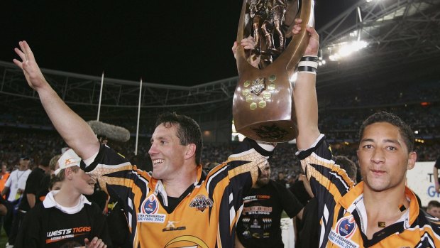 Career highlight: Benji Marshall with teammate Mark O'Neill after the Wests Tigers won the NRL grand final against the North Queensland Cowboys in 2005.