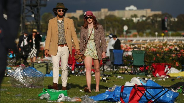 Racegoers leave Flemington.