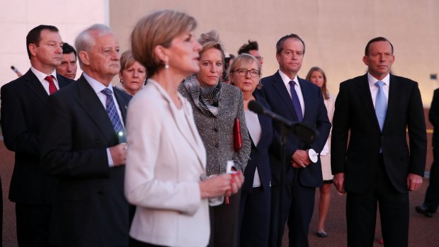 Foreign Minister Julie Bishop speaks during a candlelight vigil outside Parliament House.