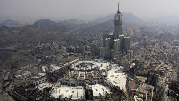 Abraj Al-Bait Towers with the four-faced clocks stands over the Grand Mosque, where a crane collapsed earlier in September killing dozens. File photo.