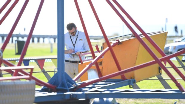 WorkSafe inspectors examine the Cha Cha carnival ride at Rye.