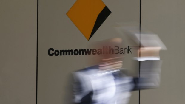 A former IT executive of the Commonwealth Bank has been charged with bribery.