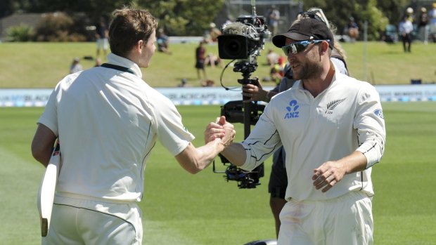 Australia's captain Steve Smith shakes hands with Brendon McCullum after the game.