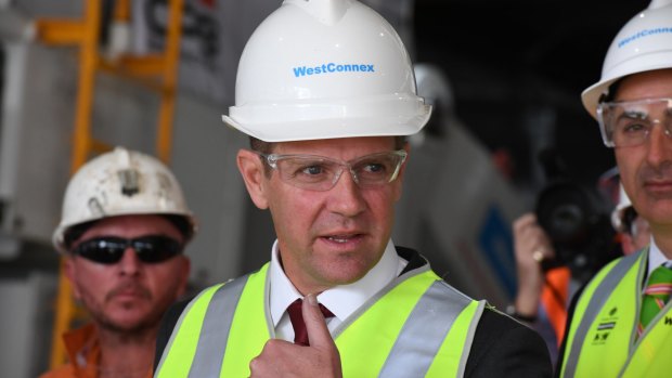 Premier Mike Baird says the government is determined to ensure homes are acquired ''fairly and compassionately'' for WestConnex.