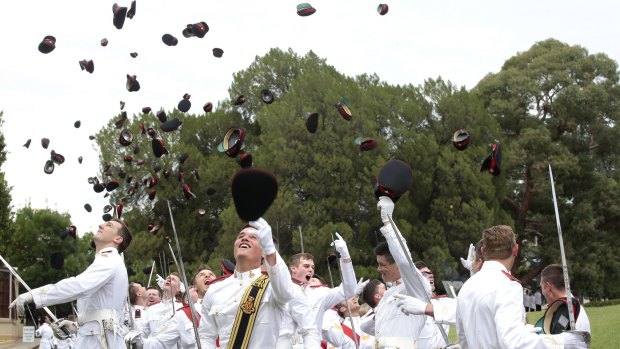 Graduates of the 2015 class at the Royal Military College, Duntroon, celebrate their success.