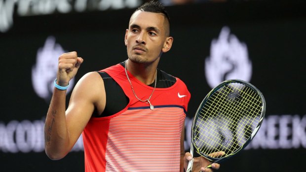 Nick Kyrgios celebrates winning a break point in his first round match against Pablo Carreno Busta of Spain during day one of the 2016 Australian Open.