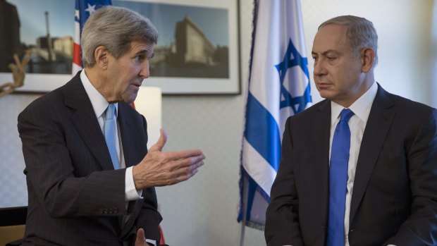 US Secretary of State John Kerry, left, speaks with Israeli Prime Minister Benjamin Netanyahu during a meeting in Berlin, Germany.