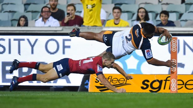 Folau Faingaa of the Brumbies attempts to score a try.