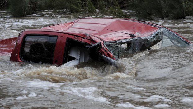 The driver of the twin cab four wheel drive vehicle died when it was swept away in Paddy's river.