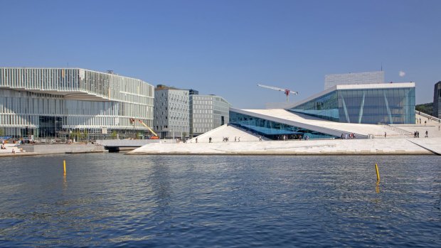 Oslo's new Deichman Library (far left) beside the city's striking Opera House.