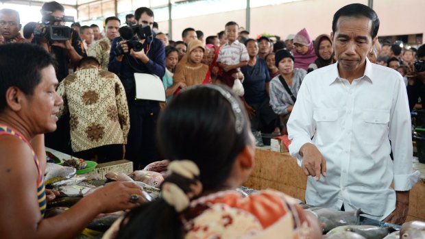 Indonesia's president Joko Widodo at a market in Lampung, Sumatra.