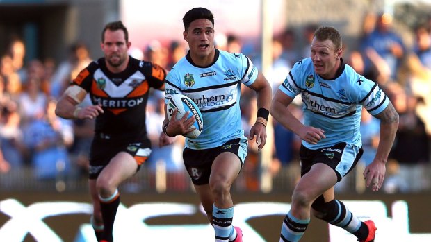 A year wiser: Valentine Holmes makes a break for Cronulla last August in the lead-up to his first NRL finals series.