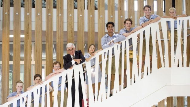 Canberra Grammar students Lachlan Byron, Alex Cresswell, Thomas Rice, Demi Katheklakis, Nithin Mathew, William Coulter, Brendan Falk, Daniel Fox, with former Canberra Grammar student Terry Snow inside the Snow Center for Education in the Asian Century.
