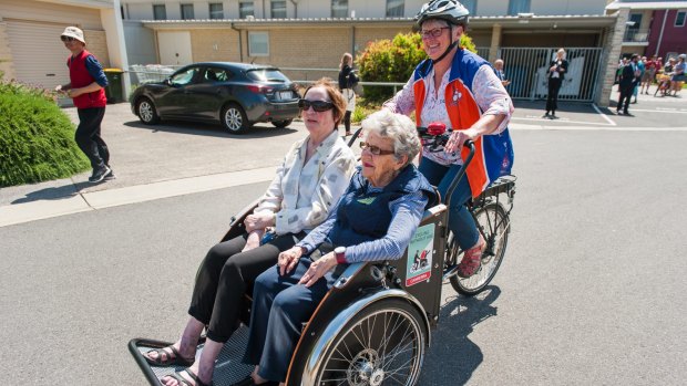 Pedal Power's Collen Laugesen take IRT Kangara Waters residents Anke Burns and Beth Hanrahan along for their Cycling Without Age program.