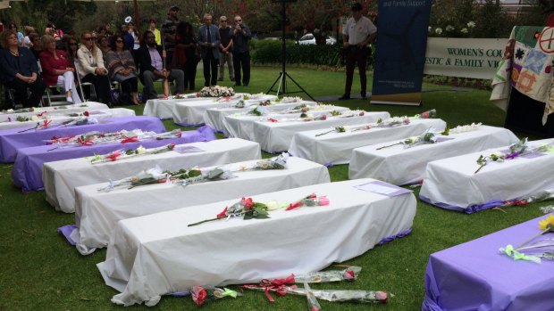 Coffins at the protest representing the number of people who have died from domestic violence this year,