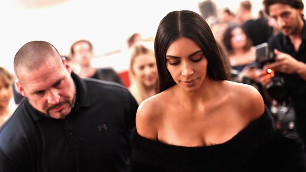 Kim Kardashian West with bodyguard Pascal Duvier in Paris on September 30, 2016. 