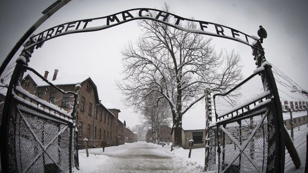 The entrance to the former Nazi concentration camp Auschwitz-Birkenau with the lettering 'Arbeit macht frei' ('Work makes you free') in Oswiecim, Poland. 