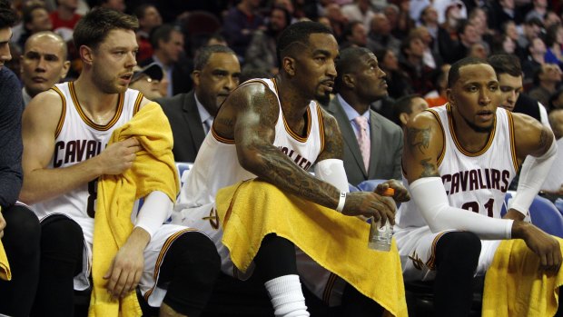 Star-studded roster: Matthew Dellavedova on the bench with JR Smith and Shawn Marion.