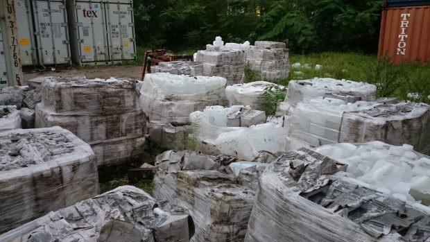 Water containers apparently left to disintegrate in open piles near the Nauru port. Photo believed to be taken late in 2015. 