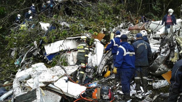 Rescue teams at the crash site of the plane carrying the Chapecoense soccer team.