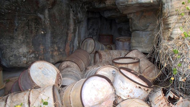 44 gallon drums piled inside a cave on West Montalivet Island - likely abandoned by RAAF personnel.