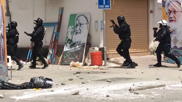 Bahraini security forces during a raid on the sit-in demonstration in Diraz. An activist said one protester was killed.  