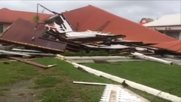 This image made from a video shows Tonga's Parliament House damaged by Cyclone Gita.