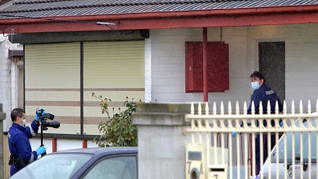 Forensic police at the Cohuna Street home. 