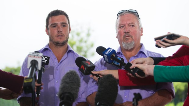 Former foster carers Cameron and Wayne Pemberton speak to media outside court.