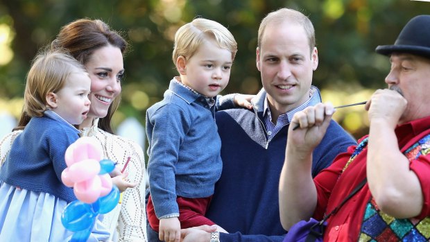 Catherine, Duchess of Cambridge, Princess Charlotte of Cambridge and Prince George of Cambridge, Prince William, Duke of Cambridge at a children's party for Military families.